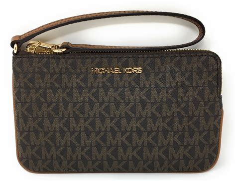 michael kors large travel wristlet|Michael Kors large wallet wristlet.